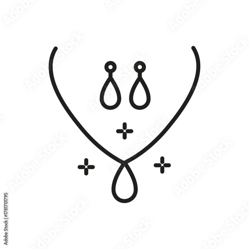 A necklace with teardrop pendant and earrings Four small cross symbols are present