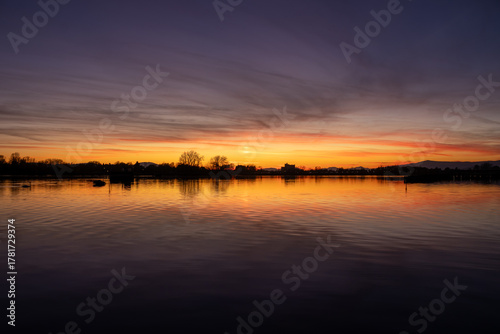 Beautiful sunset at Lake Ptuj. Wonderful autumn evening.