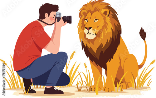 A man crouches to photograph a lion in a grassy field with his camera.