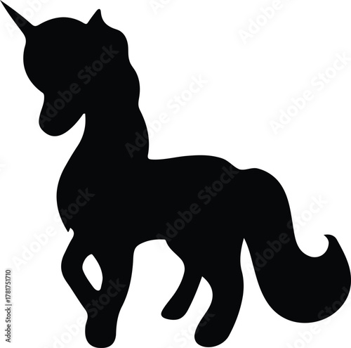 Silhouette of a majestic unicorn with a flowing mane and tail standing proudly