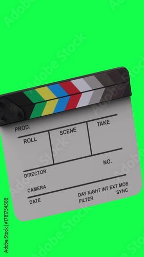 A film clapperboard with colorful stripes transition on chroma key green screen background. Change from screen to new screen vertical video
