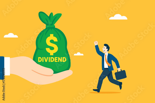 getting dividend from investment with happy businessman receives a bag of dividend money from the businessman's hand
