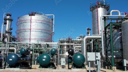 Industrial Plant Components with blue sky background, for industry-related uses