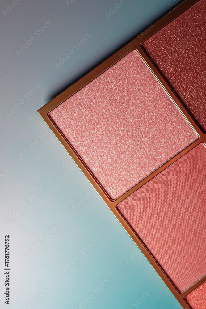 Fototapeta premium Makeup palette with blush and eyeshadow shades, presenting beauty, cosmetics, and glamour industry content