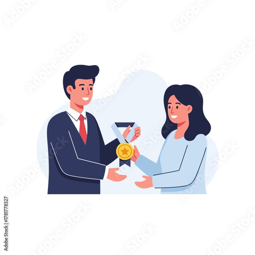 A smiling man in a business suit presents a gold medal award to a happy woman for her achievement.