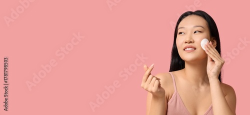 Young Asian woman with cott...