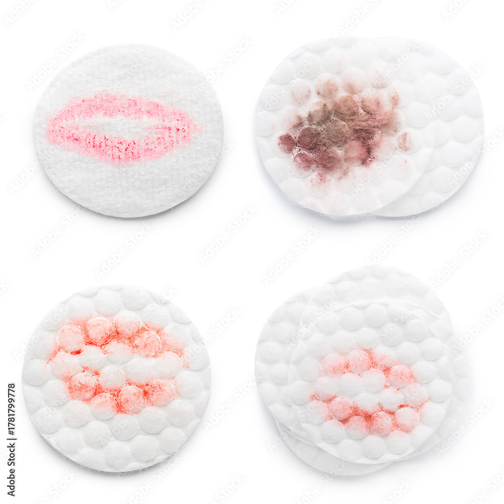 Obraz premium Set of cotton pads after makeup removal on white background, top view