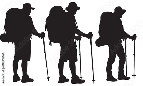 Three hikers with backpacks and trekking poles silhouette