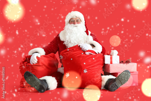 Santa Claus with bags and C...