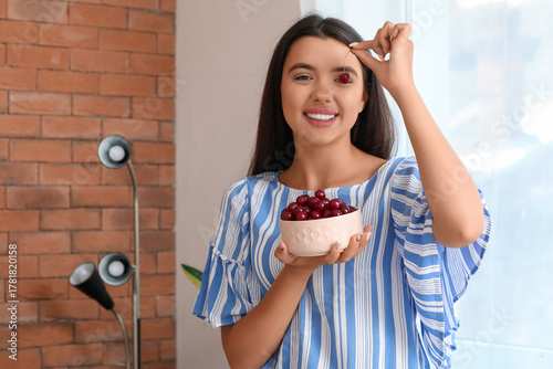 Beautiful young woman with ...