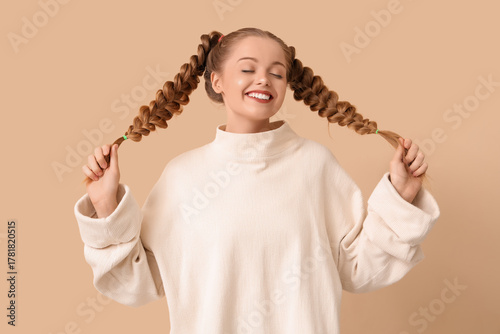 Beautiful happy young woman...