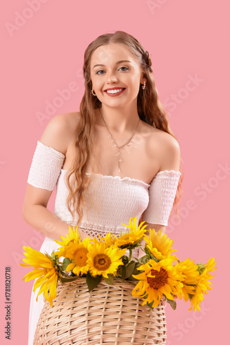 Young woman with basket of ...