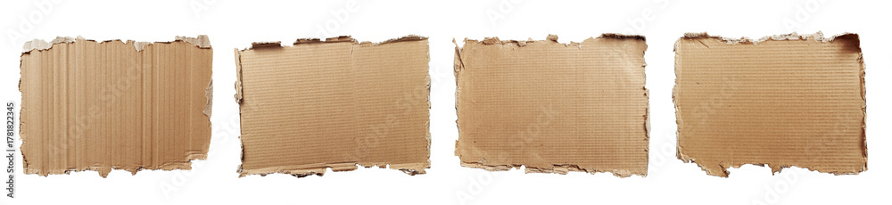 Fototapeta premium torn brown corrugated cardboard pieces on background.