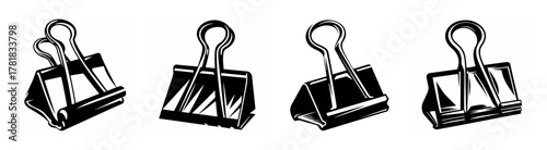 A set of four black binder clips displayed in a row showcasing their metallic grip for paper organization