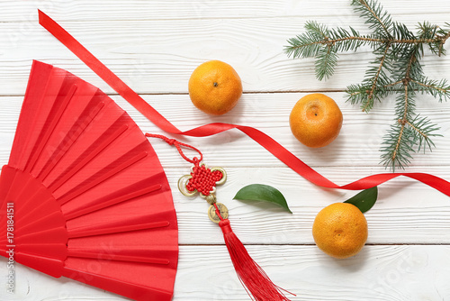 Fan with tangerines, fir br...