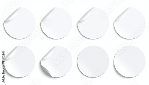 White round stickers with curls, set of eight isolated blank adhesive labels with curled edges, suitable for mockup, design, or branding presentations.