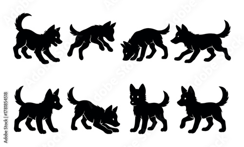 Silhouette of playful puppies in various poses against a gradient background