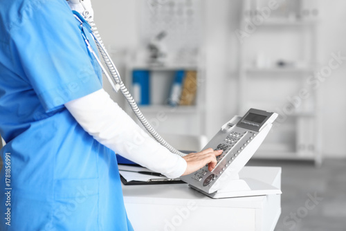 Adult female doctor talking...