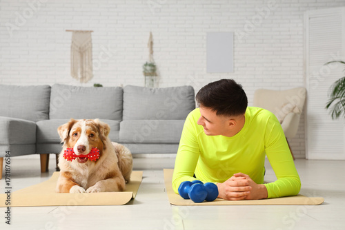 Sporty young man training w...