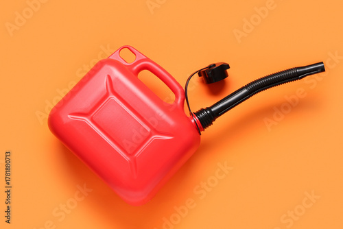 Red plastic canister with r...