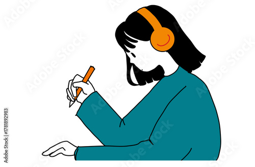 ヘッドフォンをつけて集中して勉強する女の子