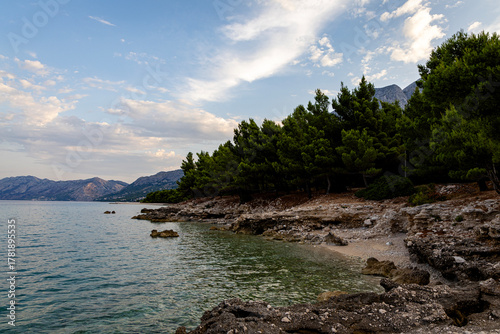 Fototapeta Naklejka Na Ścianę i Meble -  Coastline with rocky beach. Croatia, Makarska. Drone view, aerial photo.