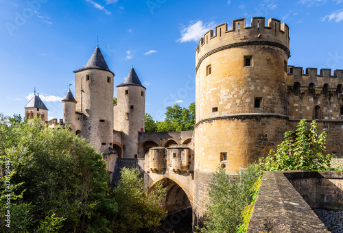 The Germans' Gate is a medieval bridge castle and city gate in Metz, France, with two round towers and two gun bastions, relic of the fortifications.