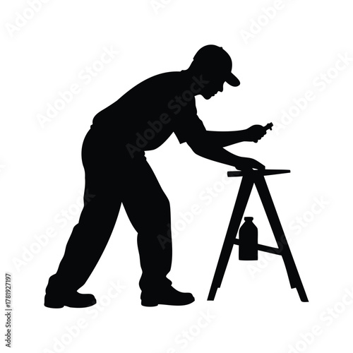 Silhouette of a craftsman repairing or creating art on a stand, person constructing silhouette vector illustration