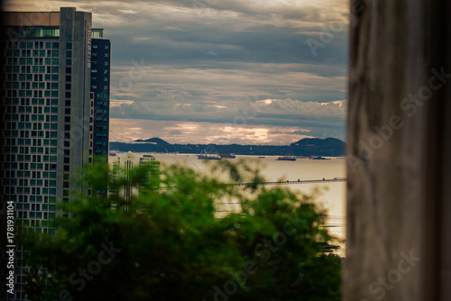 Background of a classic car steering wheel, a nine-series car with a manual transmission, a rural passenger transport vehicle in Thailand.