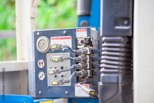Background of a classic car steering wheel, a nine-series car with a manual transmission, a rural passenger transport vehicle in Thailand.