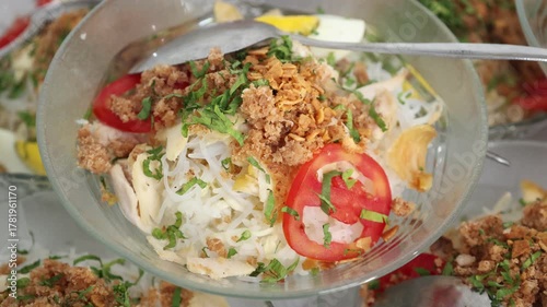 Soto ayam is a typical Indonesian food in the form of a kind of chicken soup with a yellowish sauce
