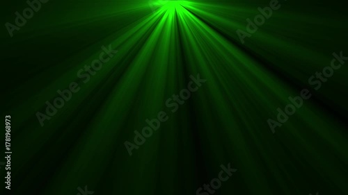 Vibrant green light beams emanating from above creating a dramatic spotlight effect on a dark