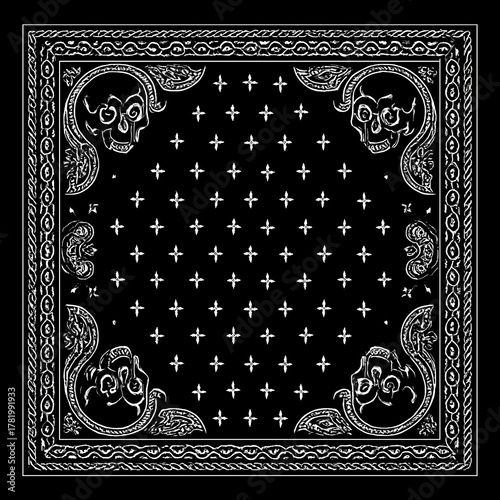Black square bandana features skulls at each corner amidst intricate cross and border pattern