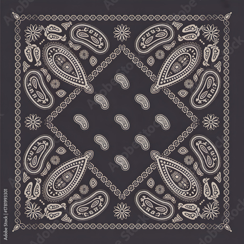 Decorative monochromatic bandana features flowers and paisley elements against a dark grey background that creates vintage appeal