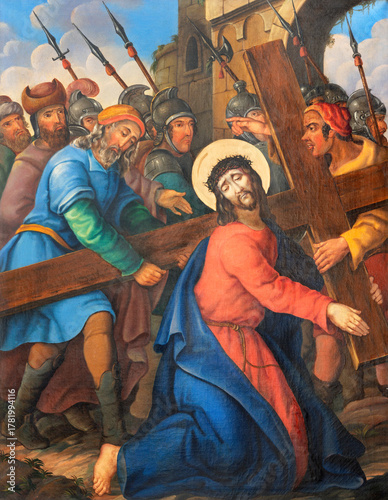 Photography Vienna - The painting  Simon of Cyrene helps Jesus carry the cross as part of Cross way stations in church Rochuskirche by unknown artist