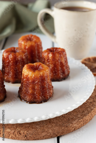Local French dessert canele served on a plate