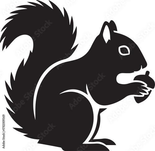 Black silhouette of a squirrel holding an acorn on a white background