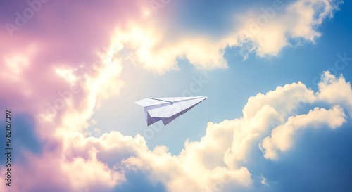 A paper airplane soars through a vibrant sky filled with fluffy clouds, symbolizing dreams, freedom, and the boundless possibilities of imagination