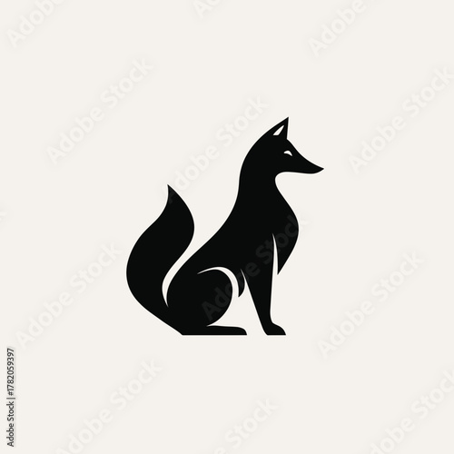Elegant black fox silhouette sitting, minimalist animal design with sleek curves for branding or graphic resources