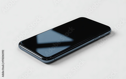 Obraz na plátně Modern black smartphone with a reflective screen lying on a light gray surface