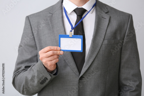 Young businessman with blan...