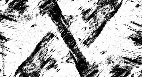 Rough grunge pattern design with bold black brush strokes and splatter effects on a faded black and white dyed paper texture, creating a vivid, abstract overlay texture suitable for graphic resources