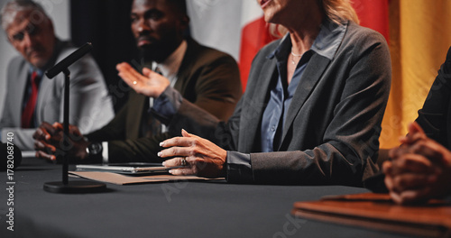 Fotografía Hands, panel and flags at international conference for geopolitics, presentation or announcement
