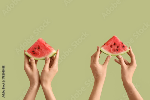 Female hands with slices of...