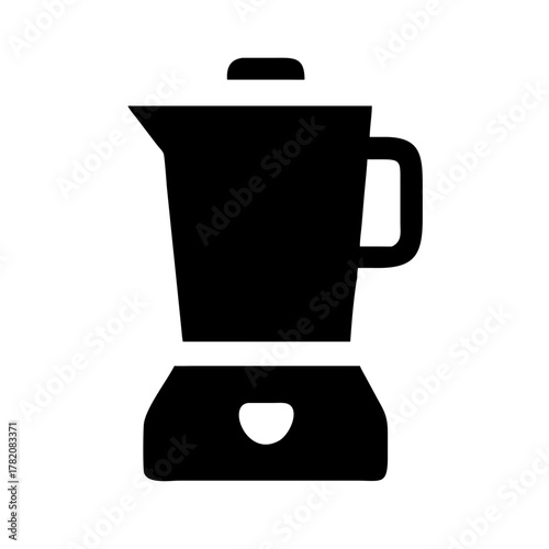 A close up of a black and white cat s face with green eyes