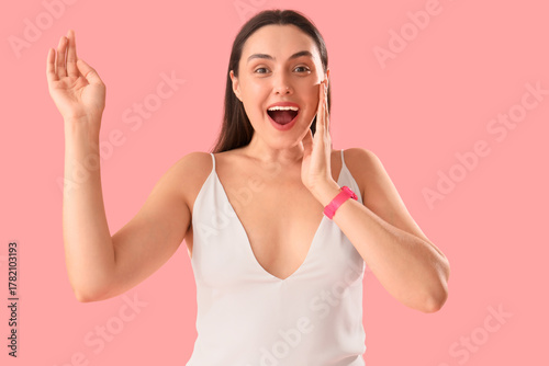 Surprised young woman with ...