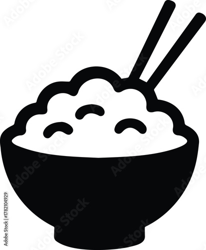 A bowl of fluffy white rice with a pair of chopsticks resting on top, , symbolizing asian cuisine, comfort food, and cultural dining experiences