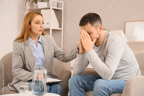 Female psychologist working...