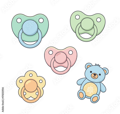 Baby pacifiers and blue teddy bear for newborn care