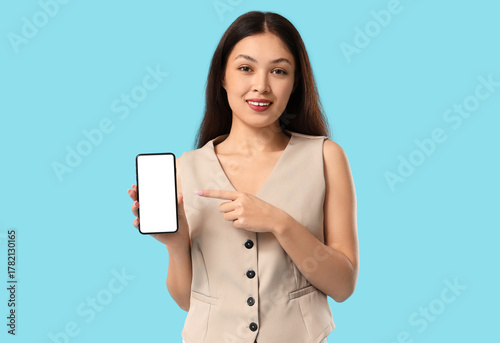 Beautiful young Asian woman...